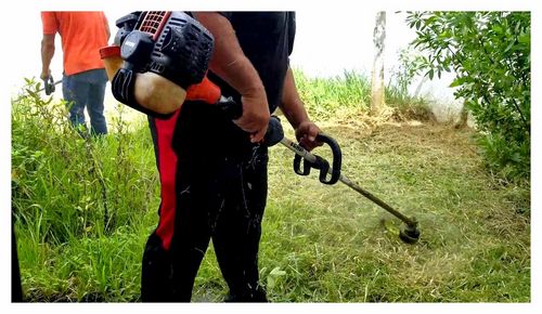 How To Cut Tall Grass With A Trimmer